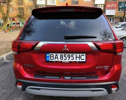 Красный Мицубиси Аутлендер, объемом двигателя 2.4 л и пробегом 125 тыс. км за 17400 $, фото 3 на Automoto.ua