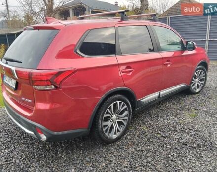 Красный Мицубиси Аутлендер, объемом двигателя 2.36 л и пробегом 110 тыс. км за 16800 $, фото 10 на Automoto.ua