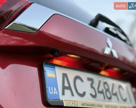 Красный Мицубиси Аутлендер, объемом двигателя 2 л и пробегом 85 тыс. км за 18900 $, фото 69 на Automoto.ua