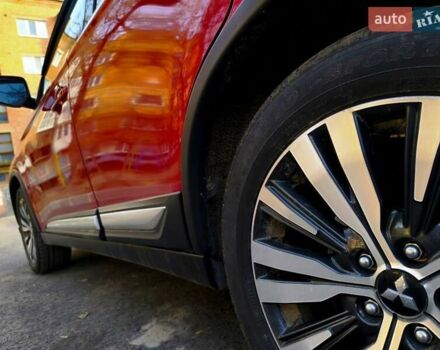 Красный Мицубиси Аутлендер, объемом двигателя 2.4 л и пробегом 125 тыс. км за 17400 $, фото 5 на Automoto.ua