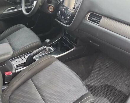 Красный Мицубиси Аутлендер, объемом двигателя 2.36 л и пробегом 110 тыс. км за 16800 $, фото 14 на Automoto.ua