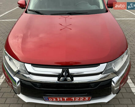 Красный Мицубиси Аутлендер, объемом двигателя 2.2 л и пробегом 118 тыс. км за 20999 $, фото 16 на Automoto.ua