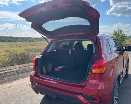 Красный Мицубиси Аутлендер, объемом двигателя 2 л и пробегом 130 тыс. км за 14300 $, фото 9 на Automoto.ua