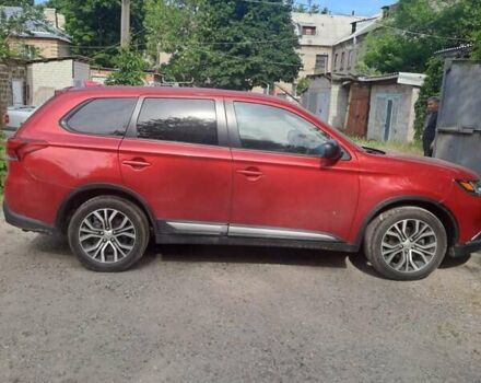 Красный Мицубиси Аутлендер, объемом двигателя 2.36 л и пробегом 82 тыс. км за 16000 $, фото 1 на Automoto.ua