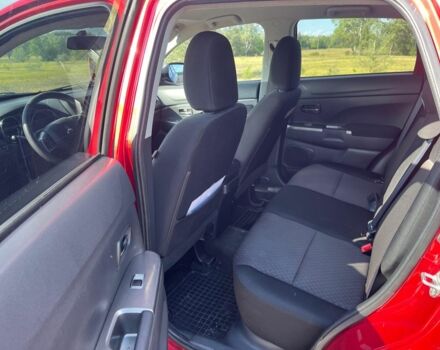 Красный Мицубиси Аутлендер, объемом двигателя 2 л и пробегом 130 тыс. км за 14300 $, фото 8 на Automoto.ua