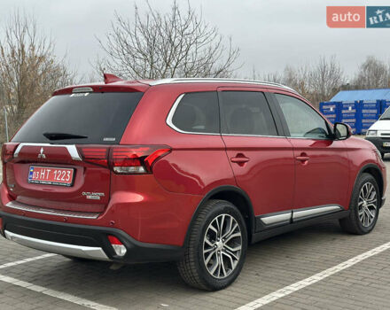 Красный Мицубиси Аутлендер, объемом двигателя 2.2 л и пробегом 118 тыс. км за 20999 $, фото 4 на Automoto.ua