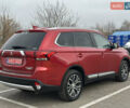 Красный Мицубиси Аутлендер, объемом двигателя 2.2 л и пробегом 118 тыс. км за 20999 $, фото 4 на Automoto.ua