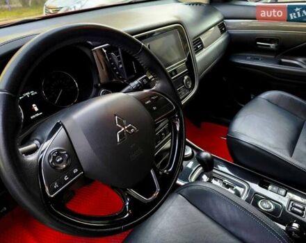 Красный Мицубиси Аутлендер, объемом двигателя 2.4 л и пробегом 125 тыс. км за 17400 $, фото 12 на Automoto.ua