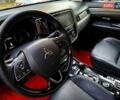 Красный Мицубиси Аутлендер, объемом двигателя 2.4 л и пробегом 125 тыс. км за 17400 $, фото 12 на Automoto.ua
