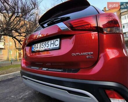 Красный Мицубиси Аутлендер, объемом двигателя 2.4 л и пробегом 125 тыс. км за 17400 $, фото 16 на Automoto.ua