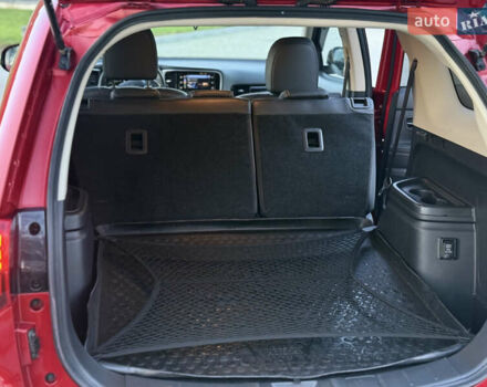Красный Мицубиси Аутлендер, объемом двигателя 2 л и пробегом 85 тыс. км за 18900 $, фото 59 на Automoto.ua