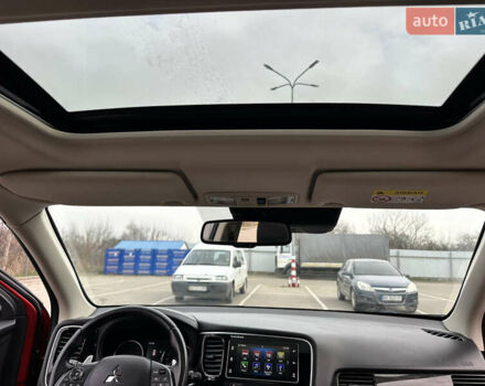 Красный Мицубиси Аутлендер, объемом двигателя 2.2 л и пробегом 118 тыс. км за 20999 $, фото 61 на Automoto.ua