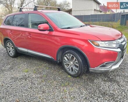 Красный Мицубиси Аутлендер, объемом двигателя 2.36 л и пробегом 110 тыс. км за 16800 $, фото 11 на Automoto.ua