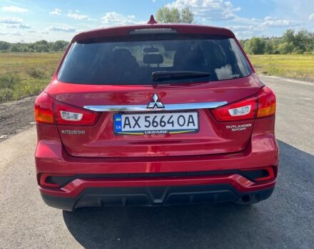Красный Мицубиси Аутлендер, объемом двигателя 2 л и пробегом 130 тыс. км за 14300 $, фото 4 на Automoto.ua