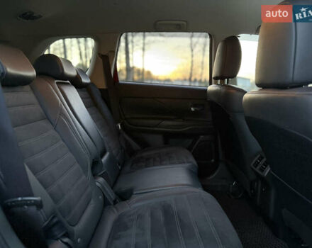 Красный Мицубиси Аутлендер, объемом двигателя 2 л и пробегом 85 тыс. км за 18900 $, фото 48 на Automoto.ua