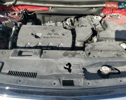 Червоний Міцубісі Аутлендер, об'ємом двигуна 2.4 л та пробігом 121 тис. км за 3500 $, фото 11 на Automoto.ua