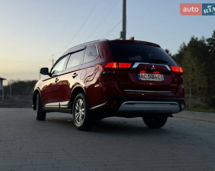 Красный Мицубиси Аутлендер, объемом двигателя 2 л и пробегом 85 тыс. км за 18900 $, фото 68 на Automoto.ua