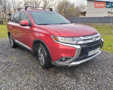 Красный Мицубиси Аутлендер, объемом двигателя 2.36 л и пробегом 110 тыс. км за 16800 $, фото 3 на Automoto.ua