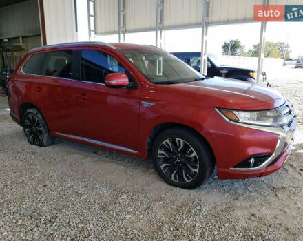Красный Мицубиси Аутлендер, объемом двигателя 2 л и пробегом 226 тыс. км за 12500 $, фото 3 на Automoto.ua