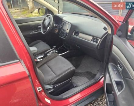 Красный Мицубиси Аутлендер, объемом двигателя 2.36 л и пробегом 110 тыс. км за 16800 $, фото 12 на Automoto.ua