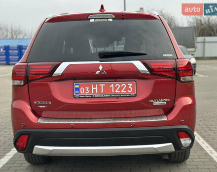 Красный Мицубиси Аутлендер, объемом двигателя 2.2 л и пробегом 118 тыс. км за 20999 $, фото 5 на Automoto.ua