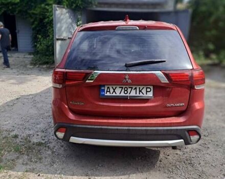 Красный Мицубиси Аутлендер, объемом двигателя 2.36 л и пробегом 82 тыс. км за 16000 $, фото 3 на Automoto.ua