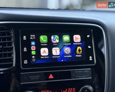 Красный Мицубиси Аутлендер, объемом двигателя 2 л и пробегом 85 тыс. км за 18900 $, фото 77 на Automoto.ua