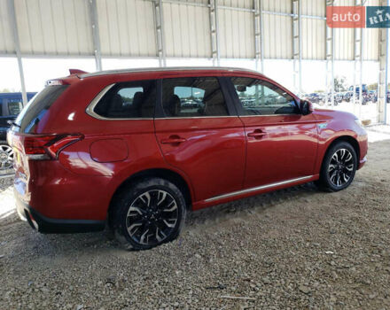 Красный Мицубиси Аутлендер, объемом двигателя 2 л и пробегом 226 тыс. км за 12500 $, фото 2 на Automoto.ua