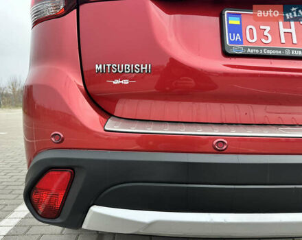 Красный Мицубиси Аутлендер, объемом двигателя 2.2 л и пробегом 118 тыс. км за 20999 $, фото 27 на Automoto.ua