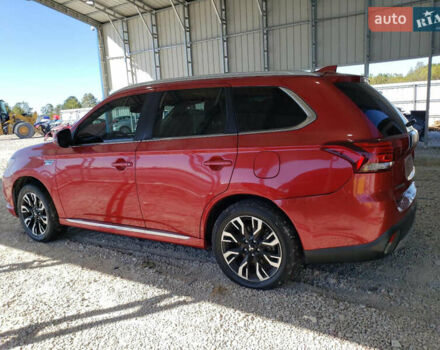 Красный Мицубиси Аутлендер, объемом двигателя 2 л и пробегом 226 тыс. км за 12500 $, фото 1 на Automoto.ua