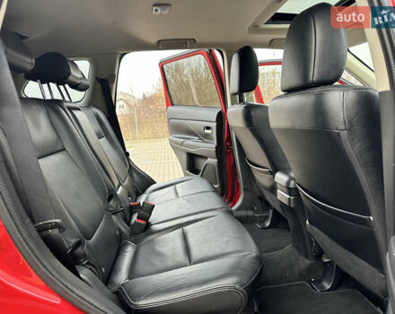 Красный Мицубиси Аутлендер, объемом двигателя 2.2 л и пробегом 118 тыс. км за 20999 $, фото 59 на Automoto.ua