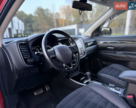 Красный Мицубиси Аутлендер, объемом двигателя 2 л и пробегом 85 тыс. км за 18900 $, фото 33 на Automoto.ua