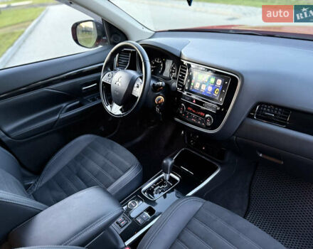 Красный Мицубиси Аутлендер, объемом двигателя 2 л и пробегом 85 тыс. км за 18900 $, фото 23 на Automoto.ua