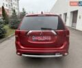 Красный Мицубиси Аутлендер, объемом двигателя 2 л и пробегом 176 тыс. км за 18900 $, фото 5 на Automoto.ua
