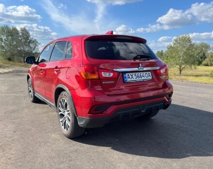 Красный Мицубиси Аутлендер, объемом двигателя 2 л и пробегом 130 тыс. км за 14300 $, фото 3 на Automoto.ua