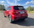 Красный Мицубиси Аутлендер, объемом двигателя 2 л и пробегом 130 тыс. км за 14300 $, фото 3 на Automoto.ua
