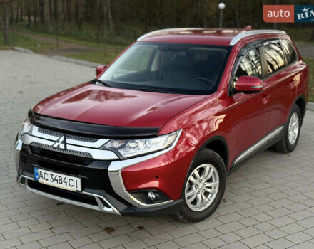 Красный Мицубиси Аутлендер, объемом двигателя 2 л и пробегом 85 тыс. км за 18900 $, фото 2 на Automoto.ua