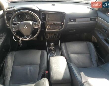 Червоний Міцубісі Аутлендер, об'ємом двигуна 2.4 л та пробігом 121 тис. км за 3500 $, фото 7 на Automoto.ua