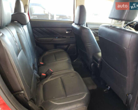 Красный Мицубиси Аутлендер, объемом двигателя 2 л и пробегом 226 тыс. км за 12500 $, фото 9 на Automoto.ua