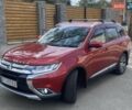 Красный Мицубиси Аутлендер, объемом двигателя 2.4 л и пробегом 75 тыс. км за 16550 $, фото 6 на Automoto.ua