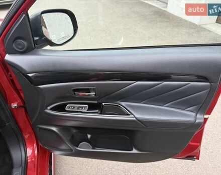 Красный Мицубиси Аутлендер, объемом двигателя 2 л и пробегом 176 тыс. км за 18900 $, фото 16 на Automoto.ua