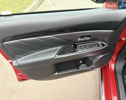 Красный Мицубиси Аутлендер, объемом двигателя 2 л и пробегом 176 тыс. км за 18900 $, фото 17 на Automoto.ua