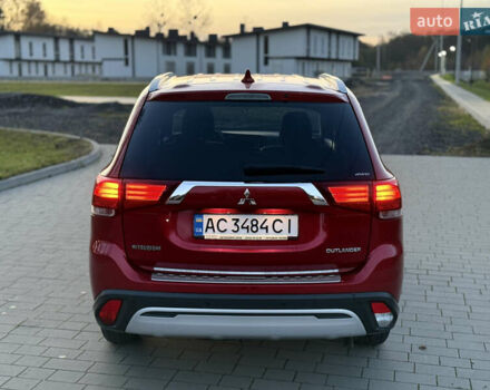 Красный Мицубиси Аутлендер, объемом двигателя 2 л и пробегом 85 тыс. км за 18900 $, фото 67 на Automoto.ua