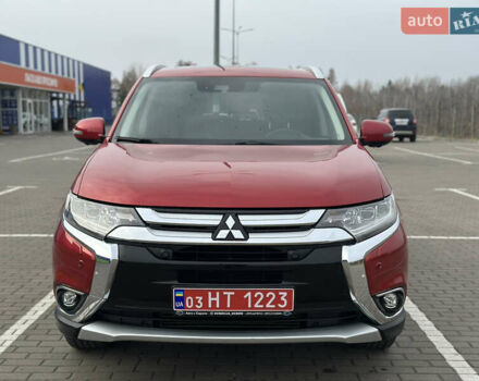 Красный Мицубиси Аутлендер, объемом двигателя 2.2 л и пробегом 118 тыс. км за 20999 $, фото 1 на Automoto.ua