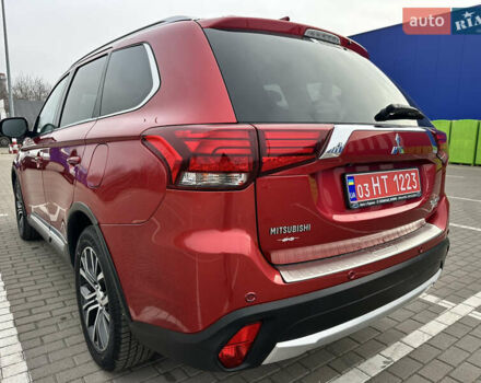 Красный Мицубиси Аутлендер, объемом двигателя 2.2 л и пробегом 118 тыс. км за 20999 $, фото 24 на Automoto.ua