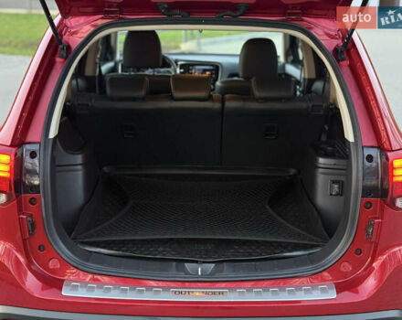 Красный Мицубиси Аутлендер, объемом двигателя 2 л и пробегом 85 тыс. км за 18900 $, фото 56 на Automoto.ua