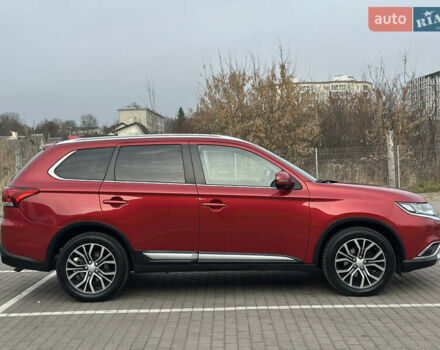 Красный Мицубиси Аутлендер, объемом двигателя 2.2 л и пробегом 118 тыс. км за 20999 $, фото 3 на Automoto.ua