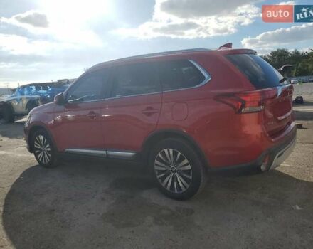 Червоний Міцубісі Аутлендер, об'ємом двигуна 2.4 л та пробігом 121 тис. км за 3500 $, фото 1 на Automoto.ua