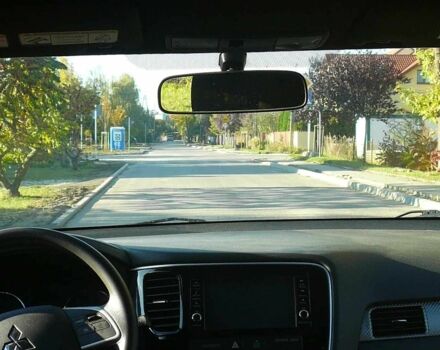 Красный Мицубиси Аутлендер, объемом двигателя 2.4 л и пробегом 117 тыс. км за 10500 $, фото 9 на Automoto.ua