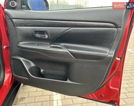 Красный Мицубиси Аутлендер, объемом двигателя 2.2 л и пробегом 118 тыс. км за 20999 $, фото 57 на Automoto.ua